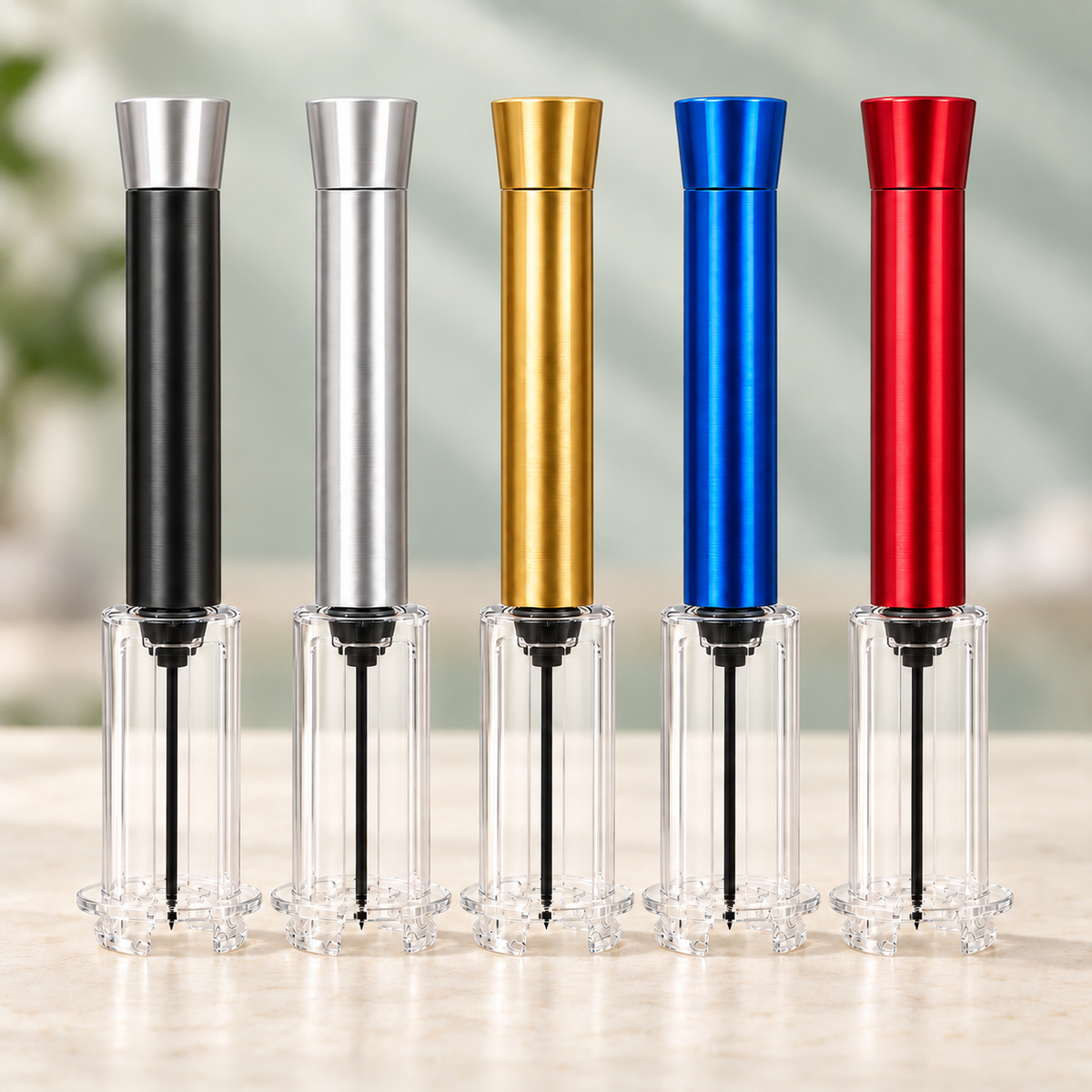 VinoPop luchtdruk-kurkentrekker in vijf kleuren: zwart, zilver, goud, blauw en rood
